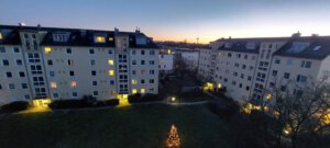 Sunset with illuminated buildings