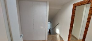 Entrance hall and staircase to the furnished apartment in Munich