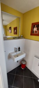 Newly decorated guest bathroom in a furnished apartment in Munich West