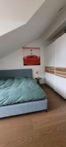 Large wardrobe in comfortable bedroom in furnished apartment in Munich West