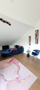 Cosy couch and large TV in furnished apartment in Munich West