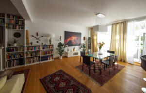 Glass dining table for six people in a furnished flat in Munich